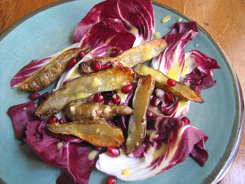 Sunchokes with Radicchio, Pomegranate Seeds & Pink Peppercorn Dressing